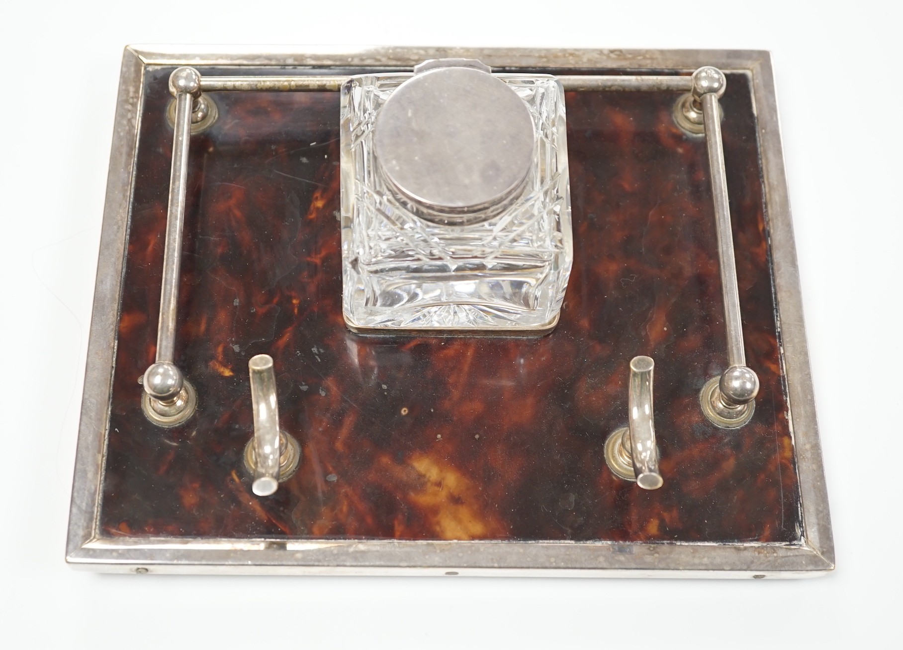 A silver plate mounted tortoiseshell inkstand, 21.5cm wide